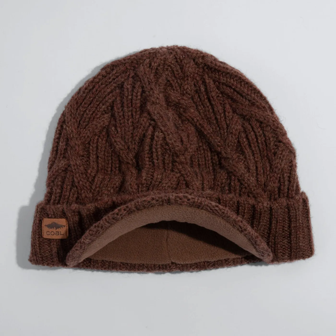 The Yukon Brim Cable Knit Wool Beanie in brown