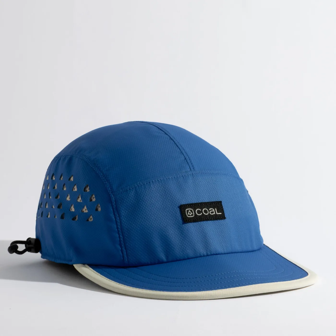The Provo UPF Tech 5-Panel Cap in blue with a bone brim